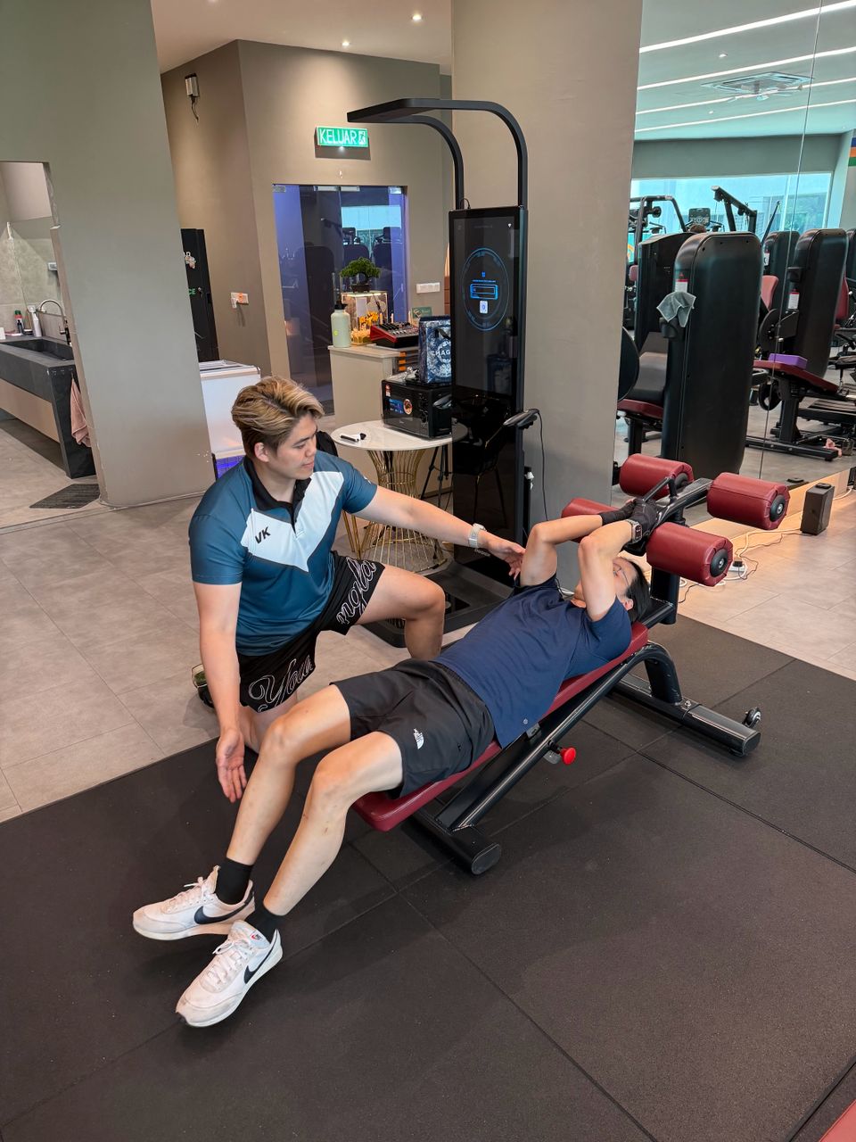Viking Fitness coach guiding a client through a session
